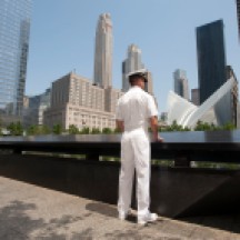 Ensign Kenneth Janson at edge of WTC Memorial, after participating in re-enlistment and promotion Ceremony as part of Fleet Week, NYC.
