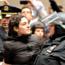 Protester being arrested at Occupy Wall Street demonstration at corner of William St. and Pine St., NYC